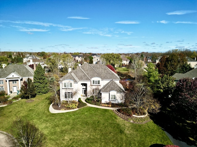 view of front of house featuring a front lawn