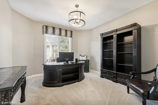 office space featuring light carpet and a notable chandelier