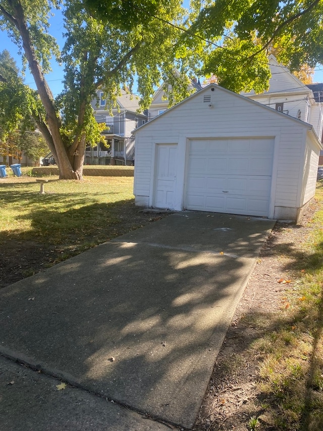 garage with a yard