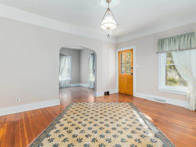 entrance foyer featuring hardwood / wood-style floors