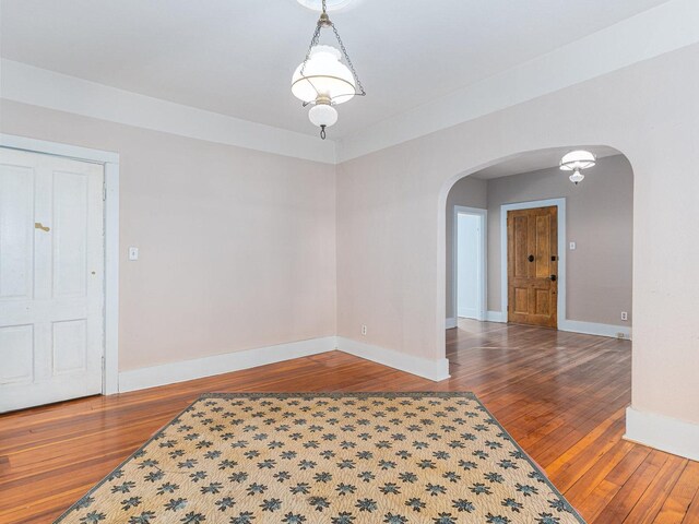 empty room featuring hardwood / wood-style flooring