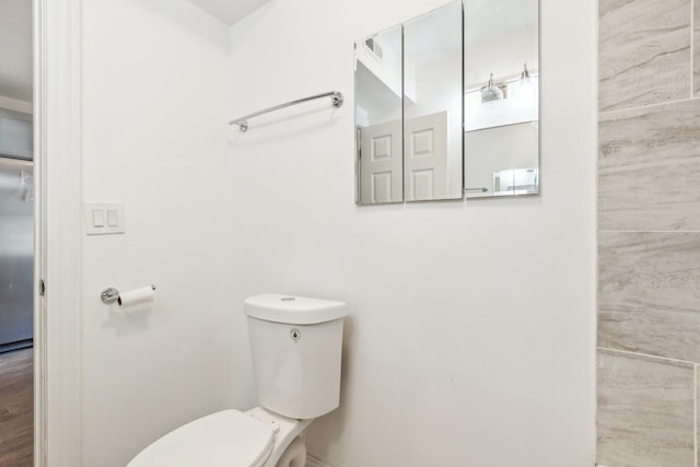 bathroom featuring toilet