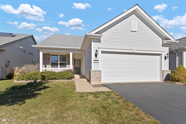 view of front facade with a front lawn and a garage