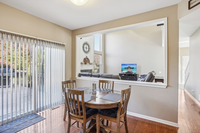 dining room featuring wood-type flooring