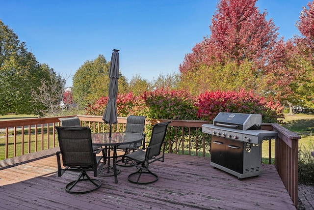 wooden terrace featuring grilling area