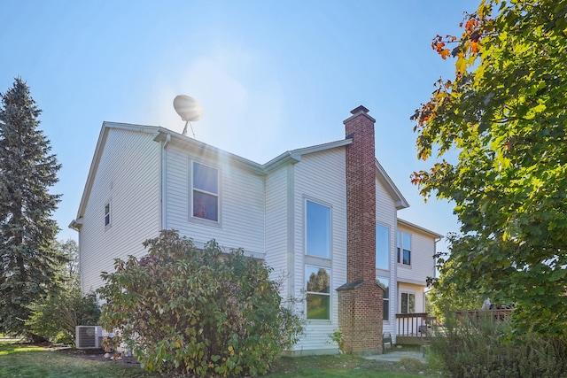 exterior space featuring central AC unit