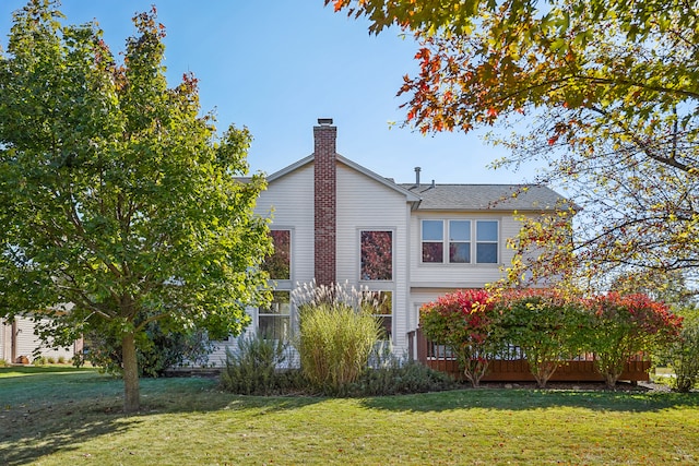 view of property exterior with a yard