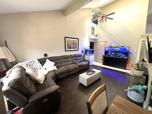 living room with ceiling fan, lofted ceiling with beams, and dark hardwood / wood-style floors