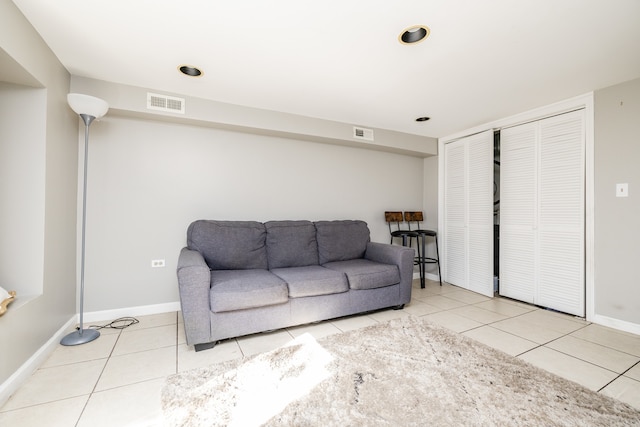 living room featuring light tile patterned floors