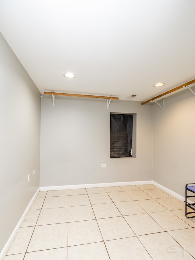 basement with light tile patterned floors