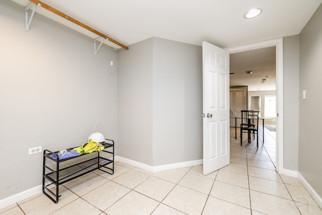 spacious closet featuring light tile patterned floors