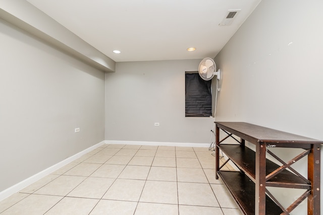 unfurnished dining area with light tile patterned floors