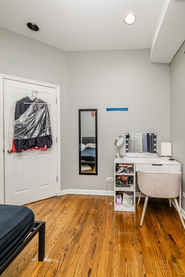 office space with hardwood / wood-style floors