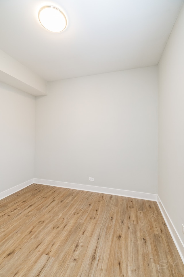 unfurnished room featuring light hardwood / wood-style flooring