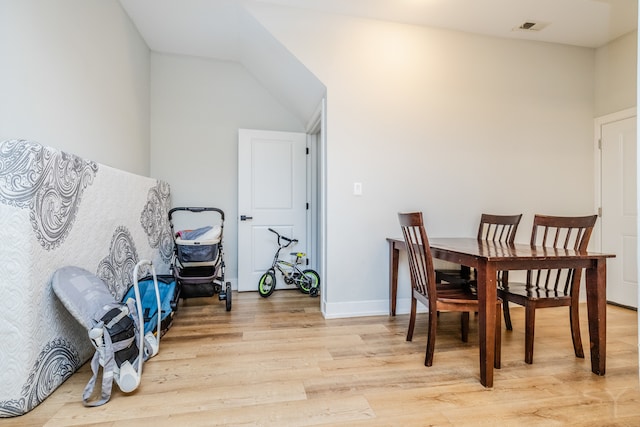 dining space featuring light wood-type flooring