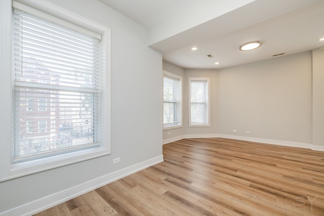 empty room featuring light hardwood / wood-style floors