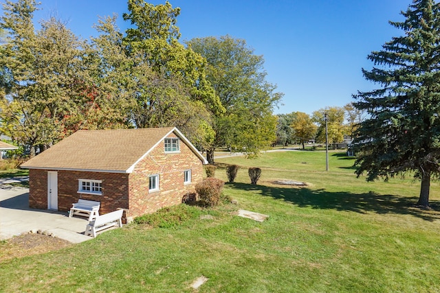 view of property exterior with a yard