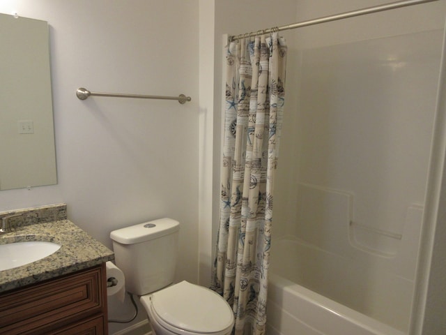 full bathroom with vanity, toilet, and shower / tub combo with curtain