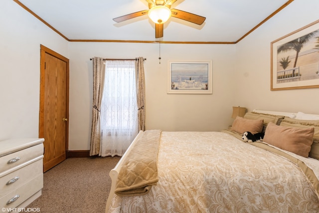 carpeted bedroom with ceiling fan and ornamental molding