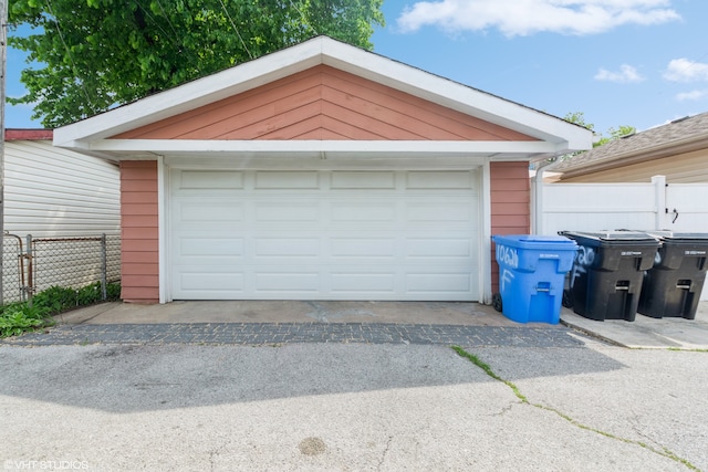 garage with wood walls