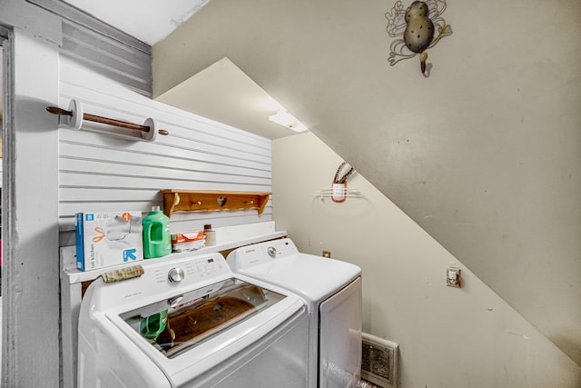 washroom featuring washing machine and dryer