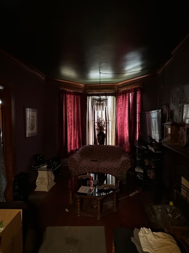 dining area with crown molding and a chandelier