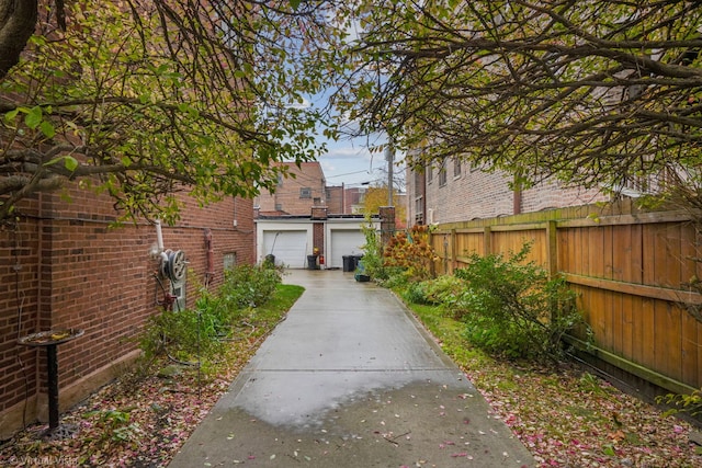 view of yard featuring a garage