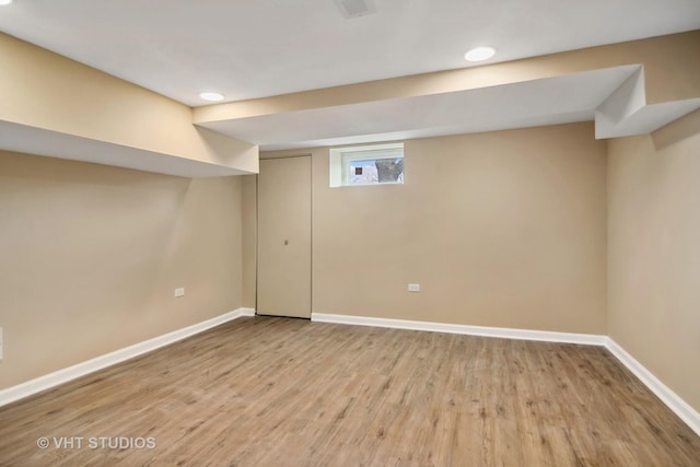 basement with light wood-type flooring