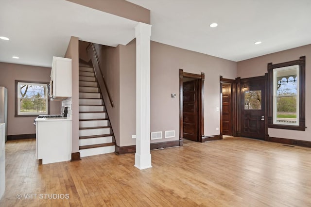 entryway with light hardwood / wood-style floors