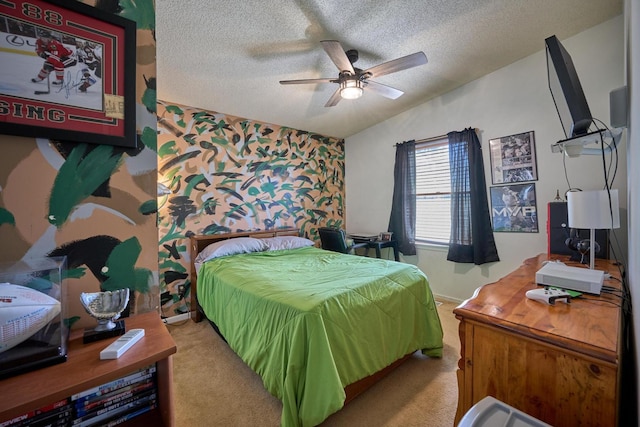 carpeted bedroom with lofted ceiling, a textured ceiling, and ceiling fan