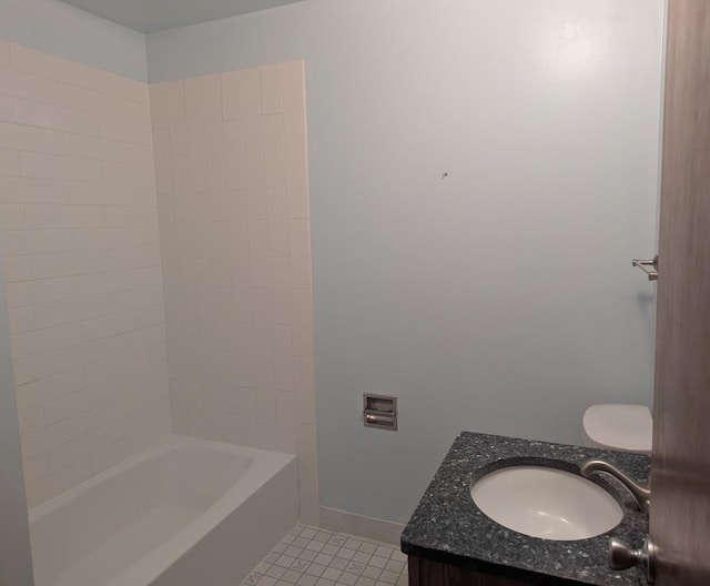 bathroom featuring shower / bathtub combination, vanity, baseboards, and tile patterned floors