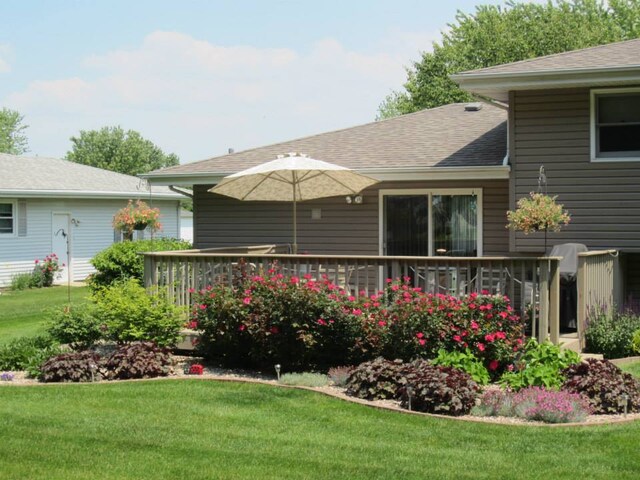 view of yard with a deck