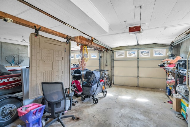 garage featuring a garage door opener