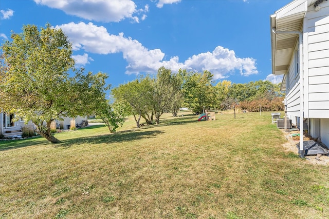 view of yard featuring central AC