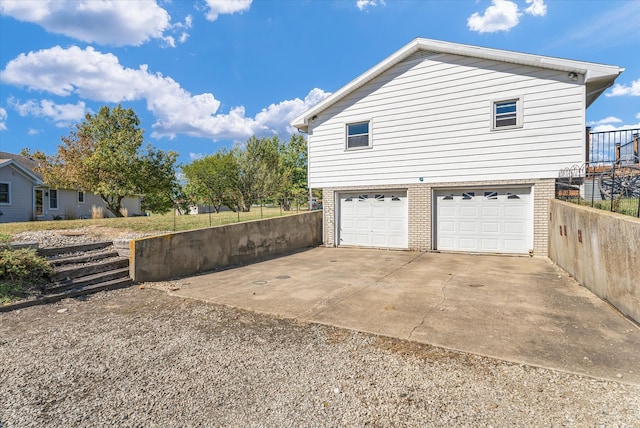 view of home's exterior with a garage