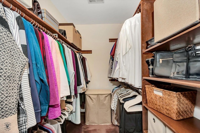 walk in closet with visible vents