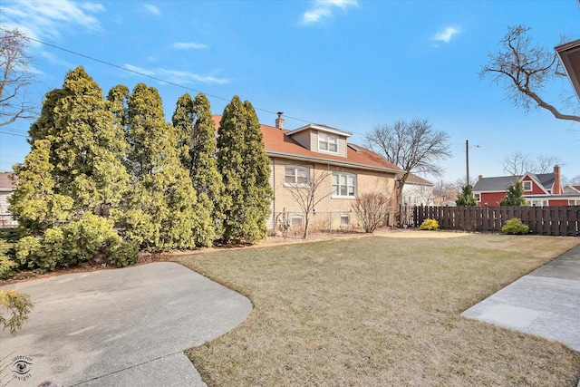 view of yard with a patio and fence