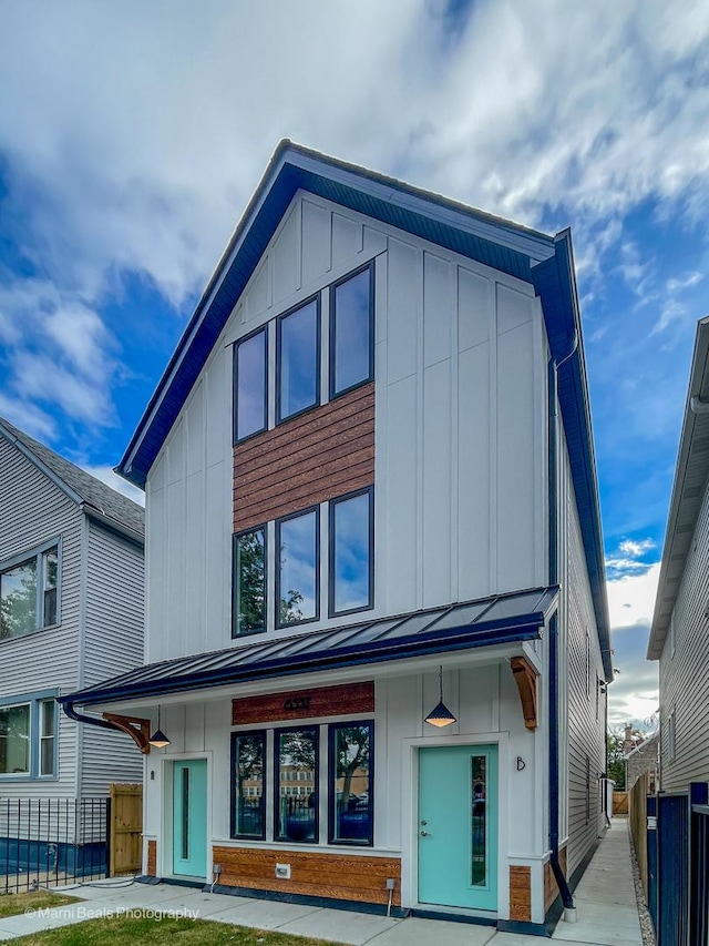 6453 S Rhodes Ave, Chicago, IL 60637 - modern home with board and batten siding and a standing seam roof