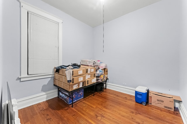 miscellaneous room with hardwood / wood-style floors