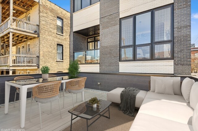 view of patio / terrace featuring a balcony and an outdoor hangout area