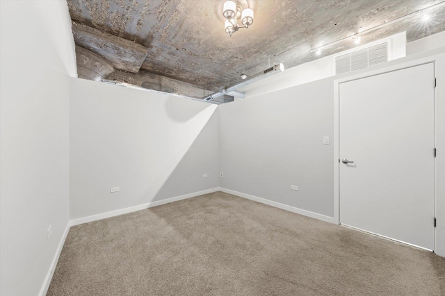 laundry room featuring stacked washer / drying machine