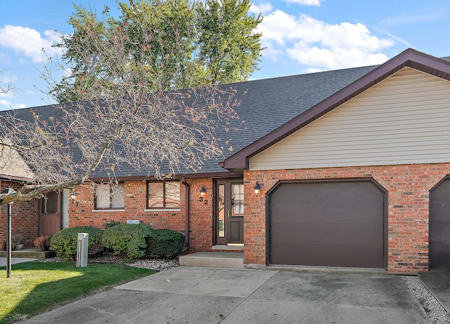 single story home featuring a garage