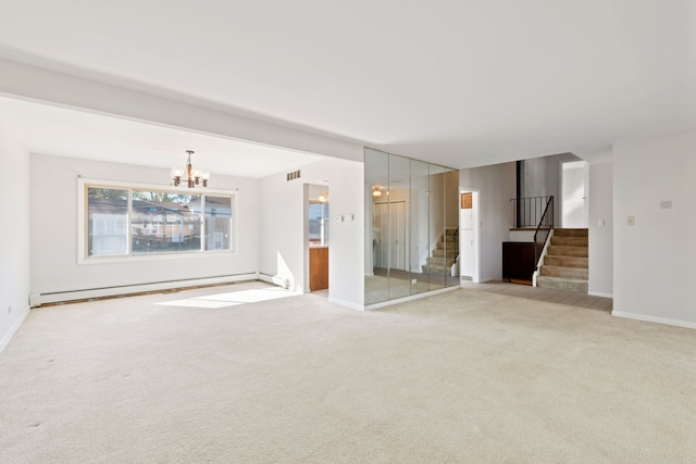 unfurnished living room with a baseboard heating unit, a notable chandelier, and light colored carpet