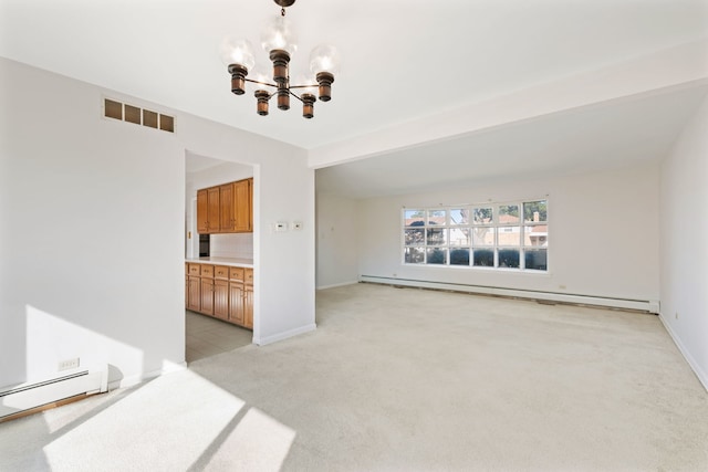 spare room with beam ceiling, a baseboard heating unit, a notable chandelier, and light colored carpet