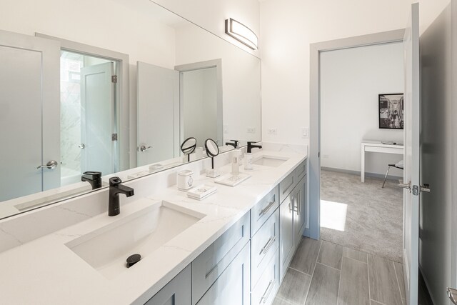 bathroom featuring vanity and walk in shower