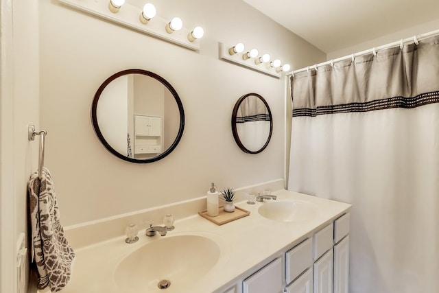 bathroom with double vanity