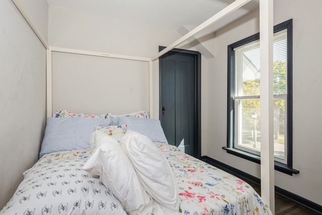 bedroom featuring dark hardwood / wood-style floors