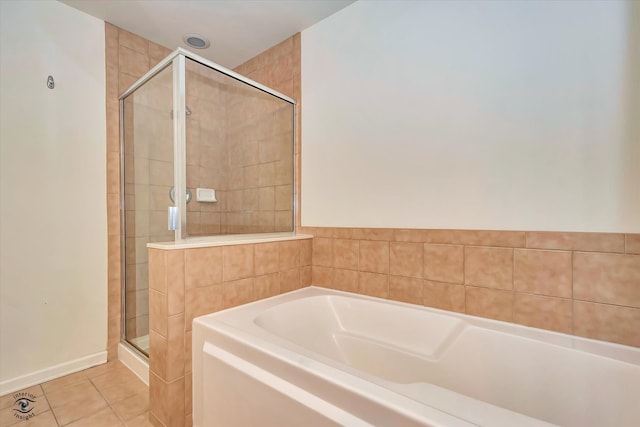 bathroom featuring tile patterned floors and plus walk in shower