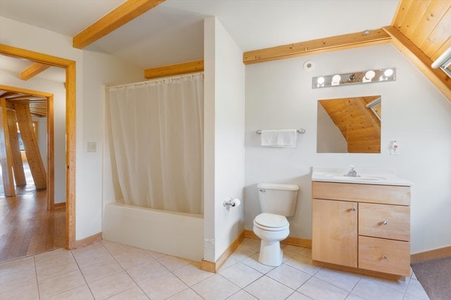 full bathroom featuring vanity, shower / bath combo, toilet, and tile patterned floors