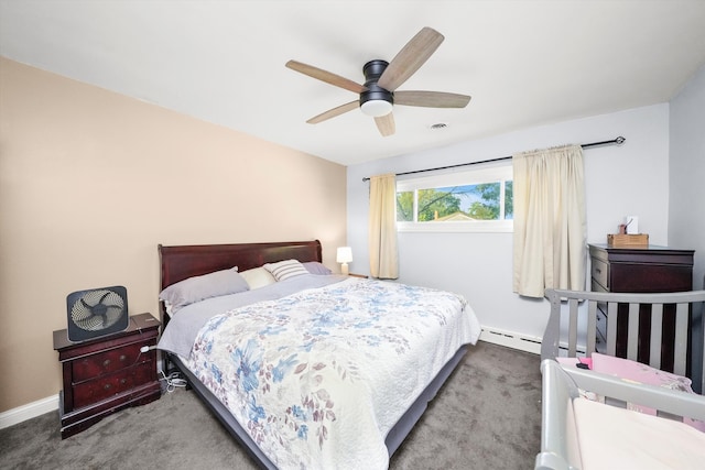 carpeted bedroom featuring ceiling fan and baseboard heating